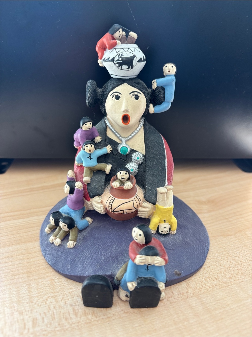 Handcrafted Pueblo Storyteller Figurine in Black and Multicolor